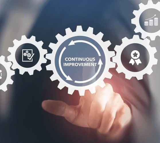 A Finger Touching a Cog of Continuous Improvement